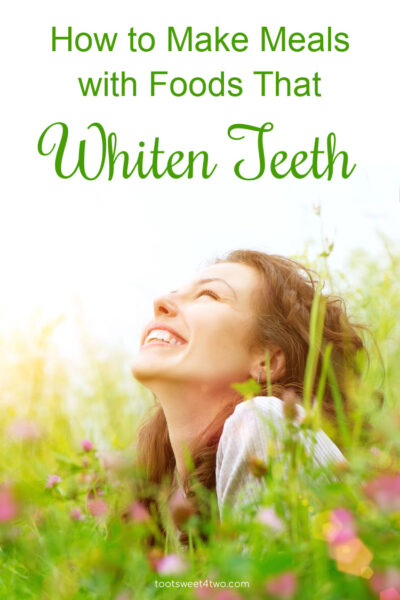 woman in a meadow smiling