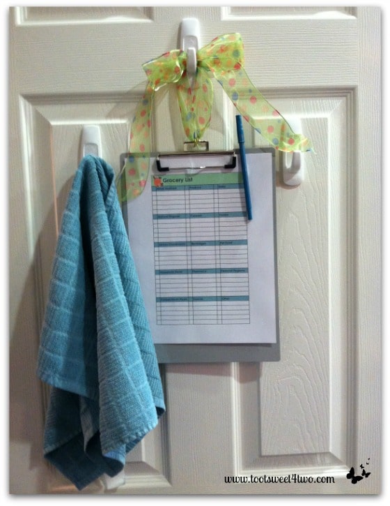 Grocery List Clipboard hanging in pantry