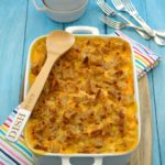 Baked Mac & Cheese with a Crunchy Sourdough Topping in a casserole dish, ready to serve.