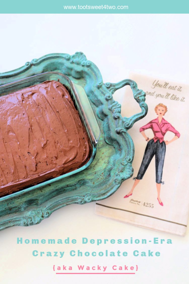 chocolate cake in a 9x13 pan on a turquoise serving tray