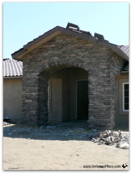 Completed stone work on front entrance.