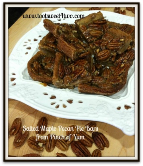 A plate full of Salted Maple Pecan Pie Bars