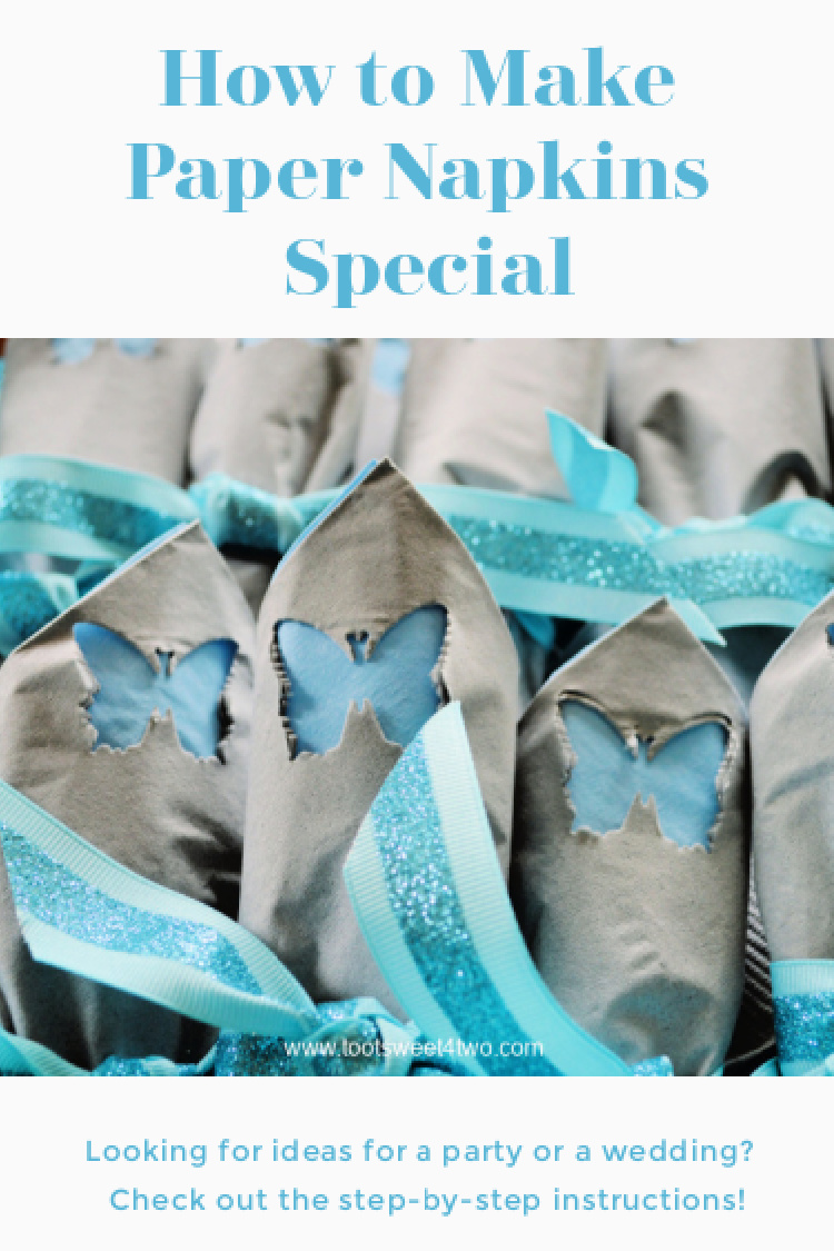 close-up of gray napkins with butterfly cut-out for a party