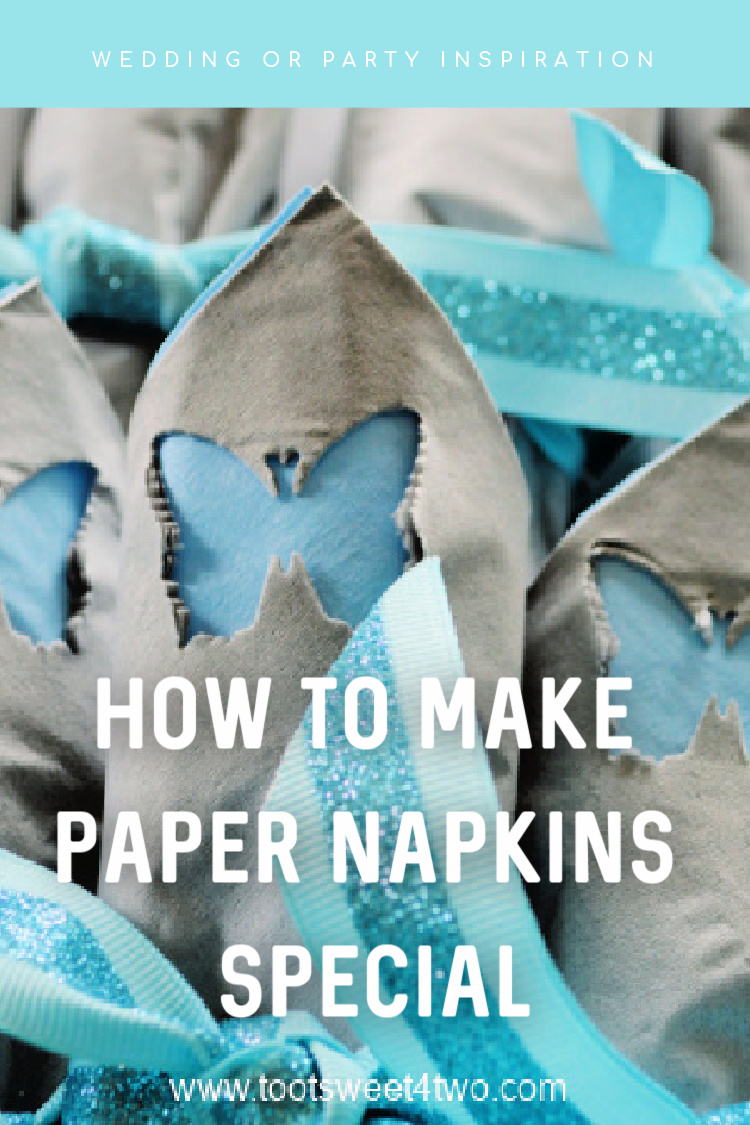close-up of gray and blue paper napkins with butterfly cut-outs