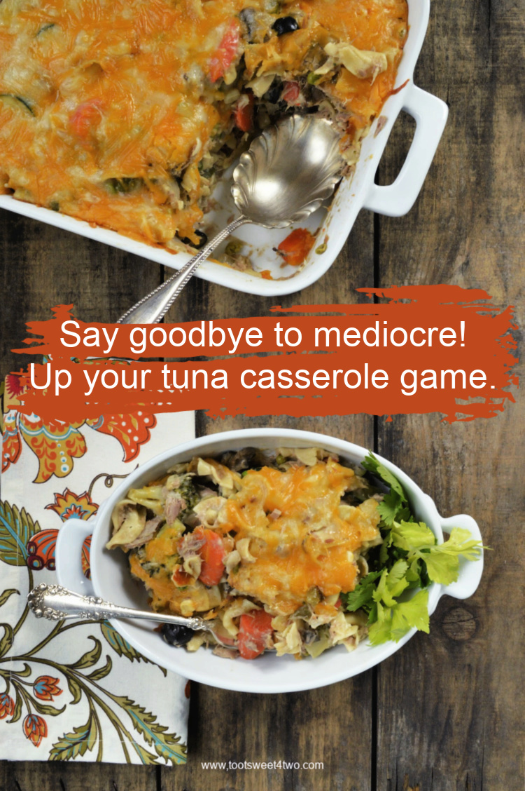 cheesy tuna noodle casserole with veggies in a casserole dish