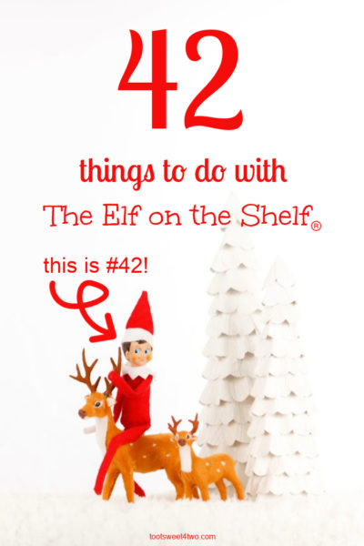 Elf on the Shelf riding a flocked reindeer