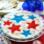 Firecracker Brownie Pie - a fun and festive 4th of July brownie recipe made with store-bought chocolate fudge brownie mix. Jarred hot fudge topping, vanilla ice cream and a surprise ingredient make easy Independence Day dessert worthy of any Patriotic party celebration! Add sparkly red and blue stars by using various size star-shaped cookie cutters! | www.tootsweet4two.com