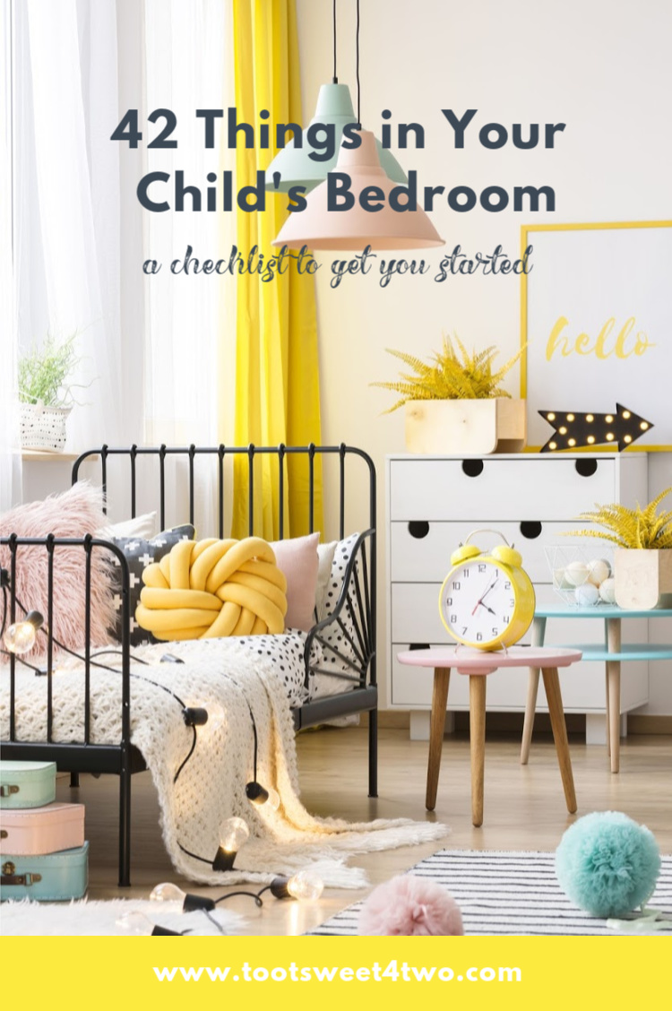 beautiful child's bedroom in black, yellow, pink and blue