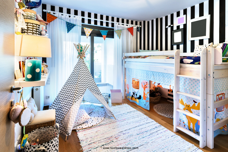 cute child's bedroom with bunk wooden bed, teepee, stands, carpet frames and toys
