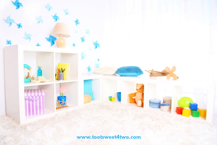 bookshelves with children's toys and books