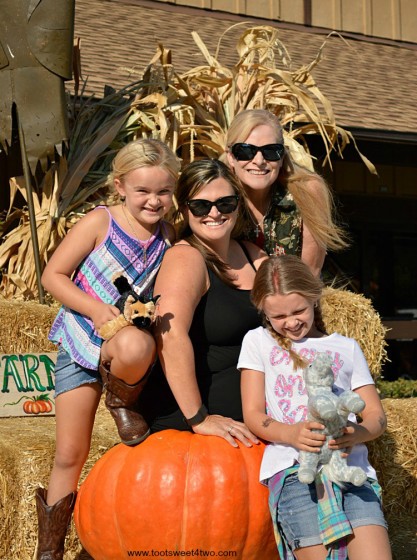 My family stacked on Big Mac pumpkin at Bates Nut Farm