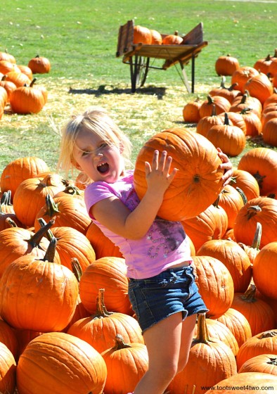 Princess Sweetie Pie power lifting a pumpkin