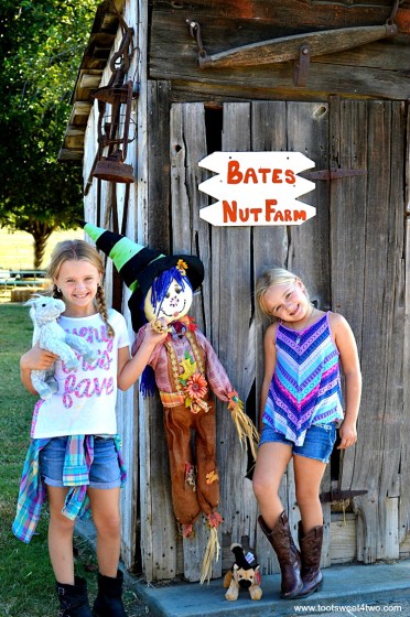 Princesses P posing with scarecrow 2015