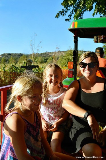 Tiffany and the Princesses P on a hay ride at the pumpkin patch 2015