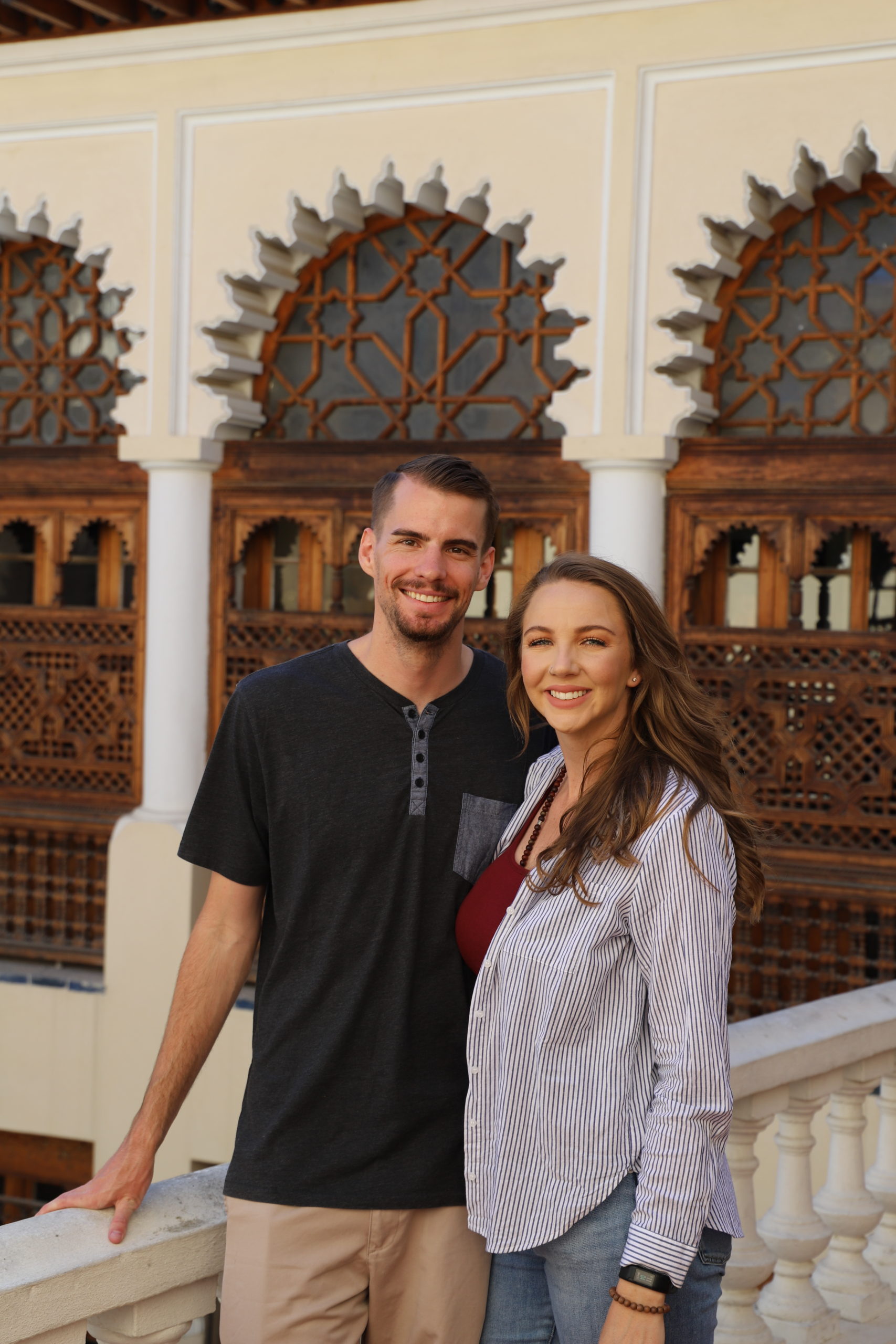 Image of authors Jacqueline and Dylan standing in a museum in Morocco.