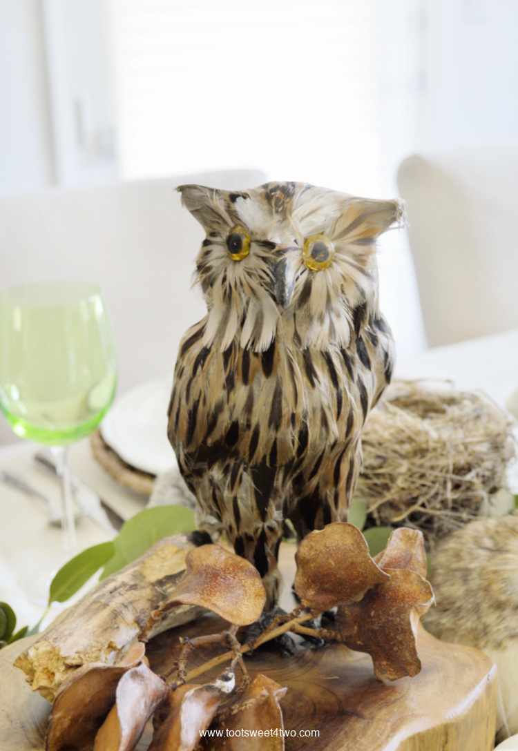 faux brown-feathered owl table decor