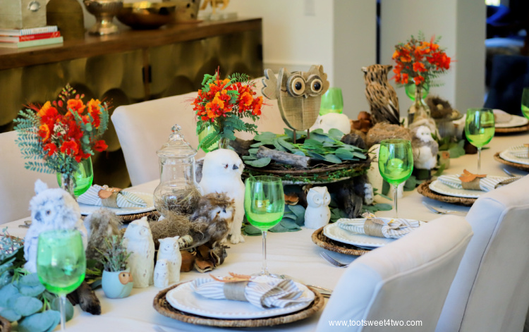 side view of dining table set with owl table decor